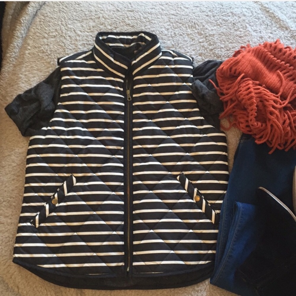 L. Black and white striped puffer vest